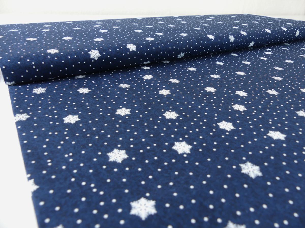 Patchworkstoff Schneesterne, blauer Untergrund